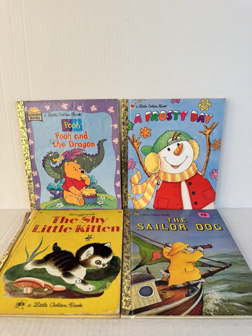 Lot 4 Little Golden Books Shy Little Kitten Pooh Dragon Frosty Day Sailor Dog